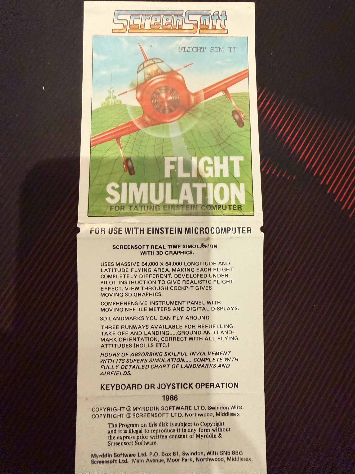 The inlay opened out: description and 1986 Myrddin and Screensoft copyright