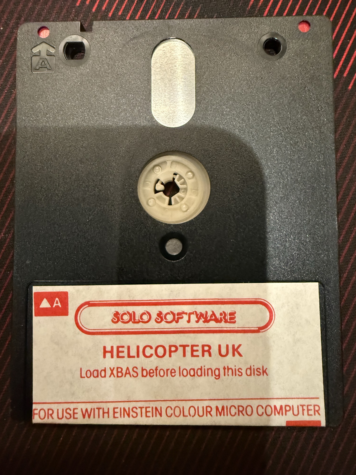 The disc, side A: Helicopter UK, load XBAS before loading this disk