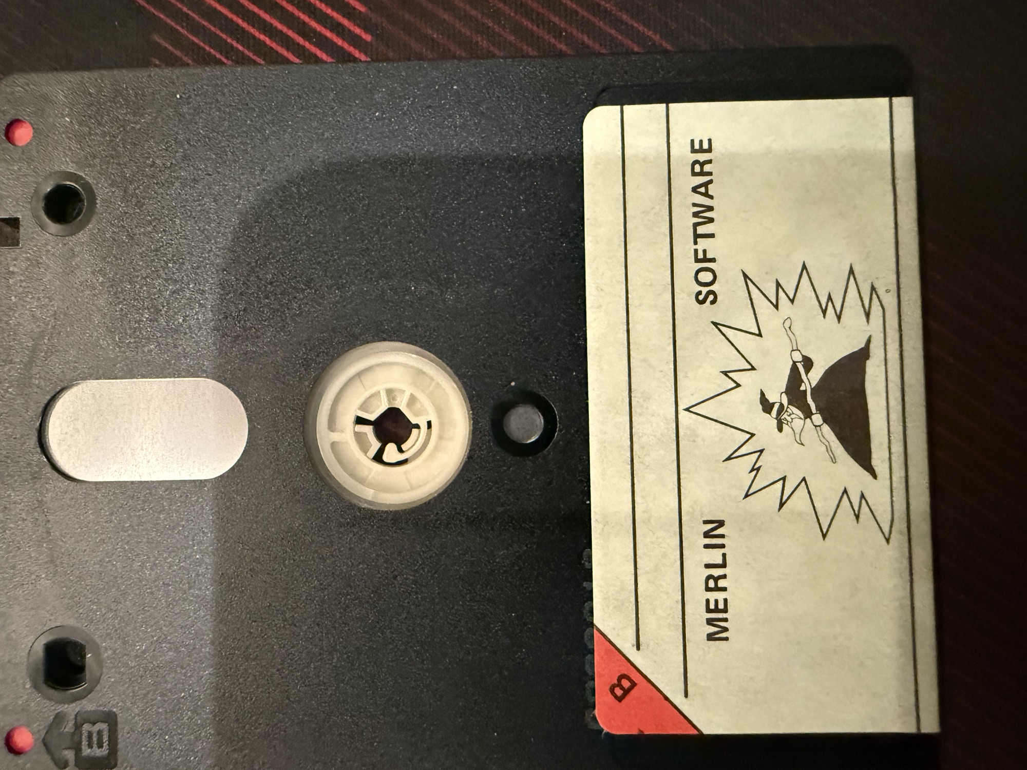 Side B of the disc, a blank Merlin Software label