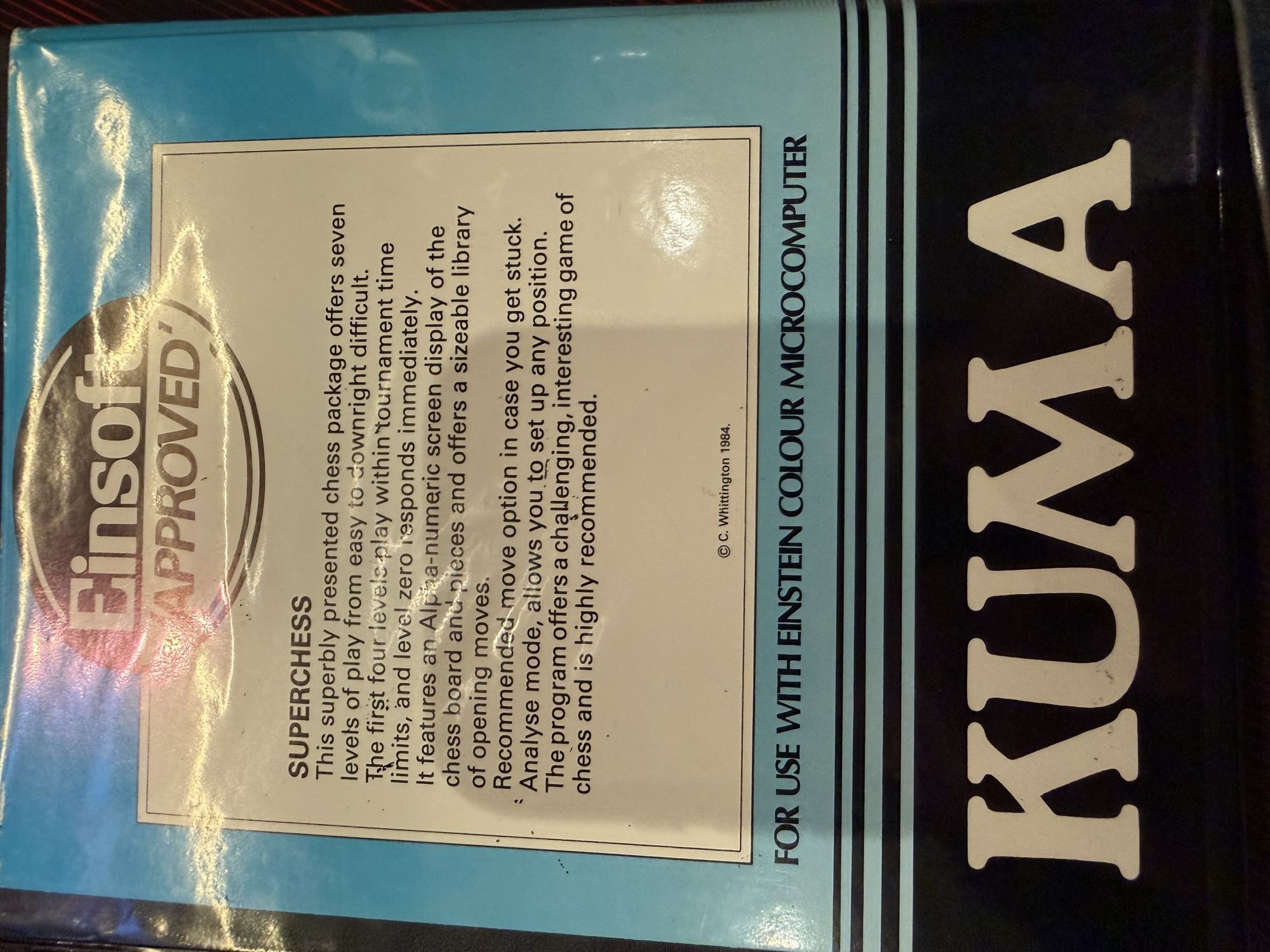 Case back describing the program, (C) C. Whittington 1984
