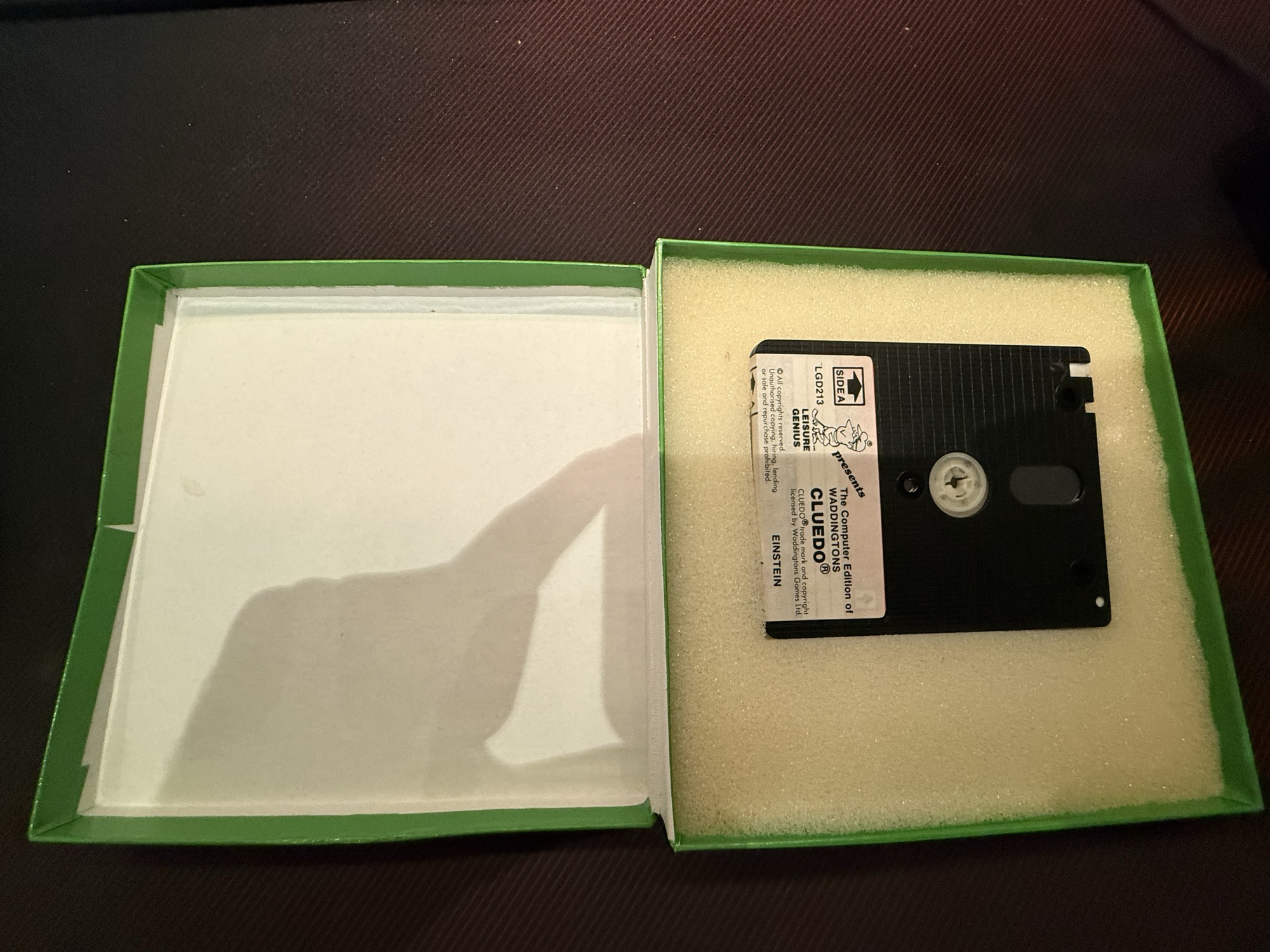The box open with the disc