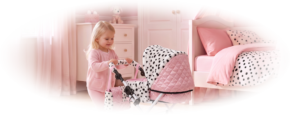 Little girl in pink pajamas pushing a pink doll stroller while a Dalmatian puppy lies on the rug.