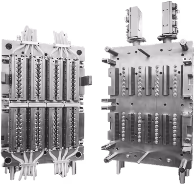 Two large metal industrial molds with multiple injection points and valves, shown side by side against a white background.