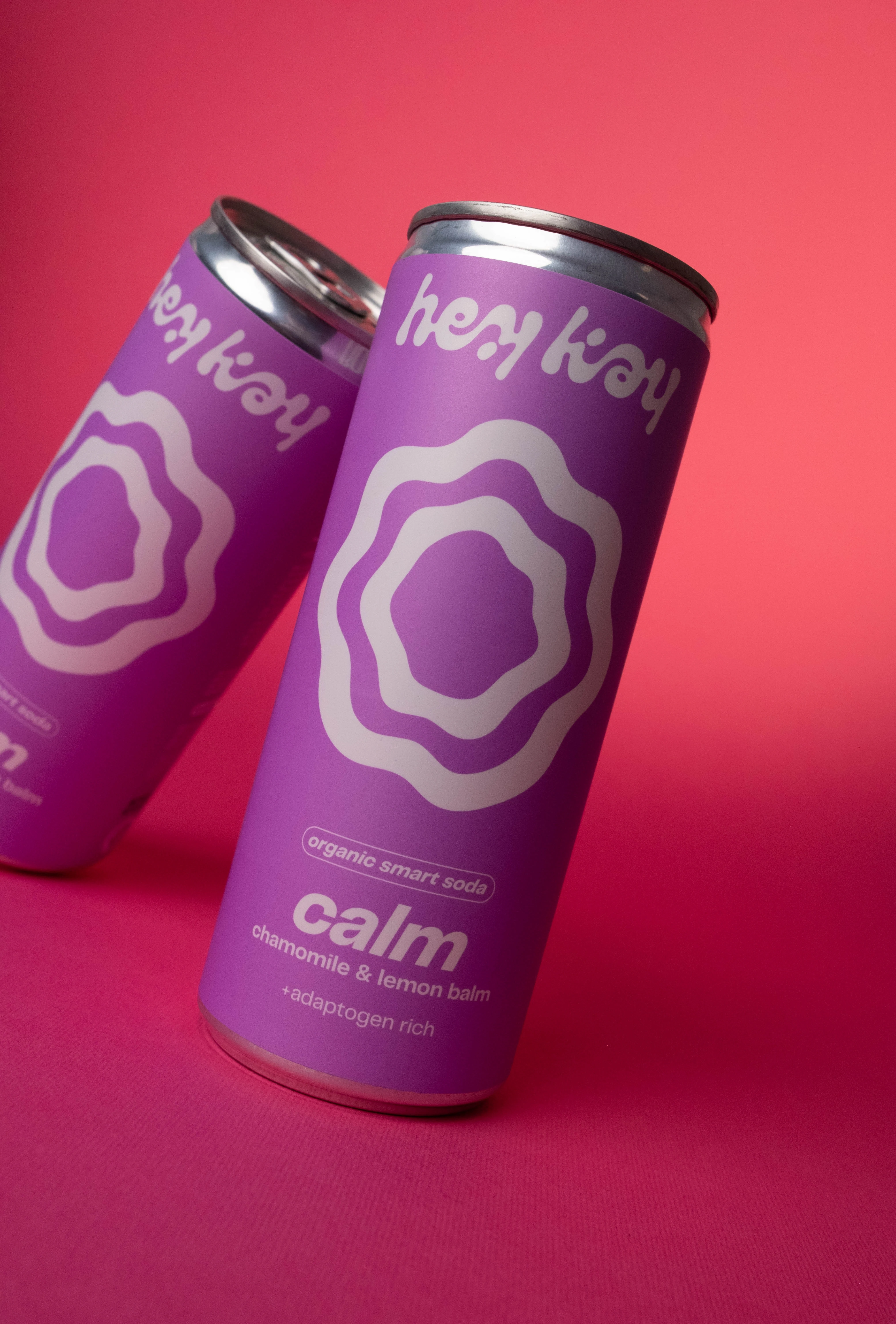 Close-up of a hey kay calm can on a pink background