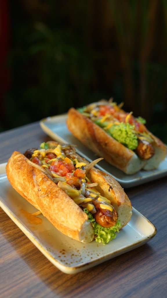 Loaded vegan hot dogs from Plant Theory, perfect for late-night delivery in Canggu