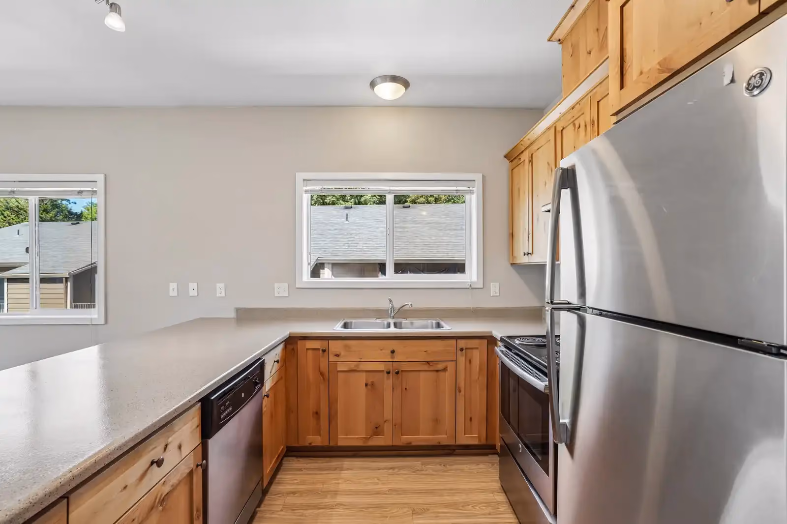 Kitchen with wood cabinets and stainless steel appliacnes