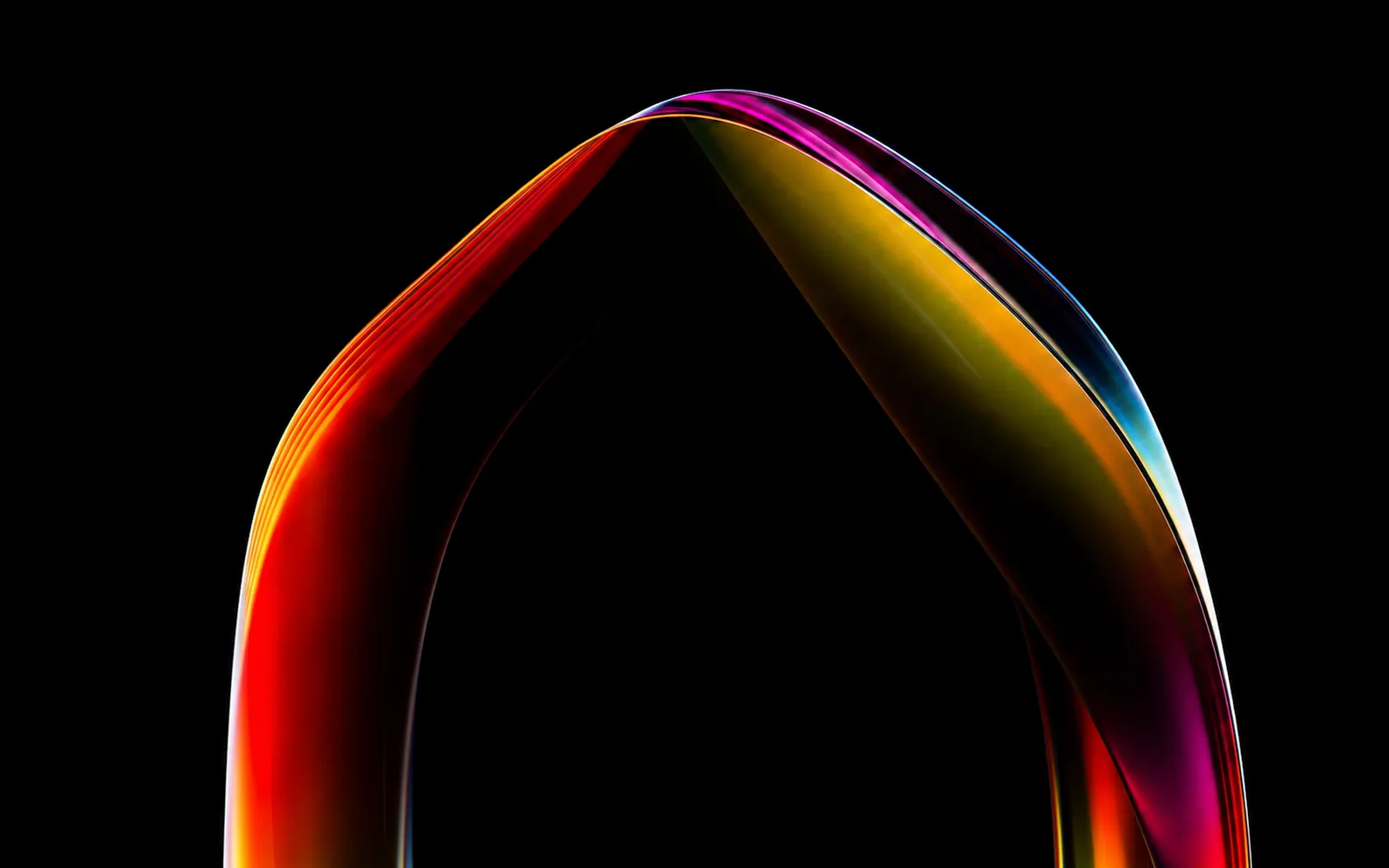 Abstract curved shape with smooth translucent surfaces in vibrant gradient colors of red, orange, yellow, purple, and blue on a black background.
