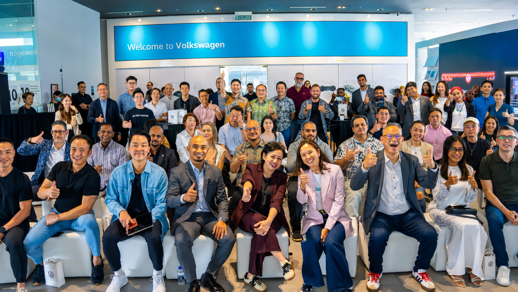 Volkswagen dealership event — full group photo