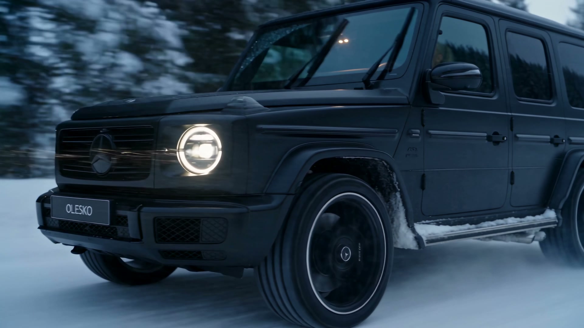 Matte black Mercedes-AMG G 63 in mountain snow