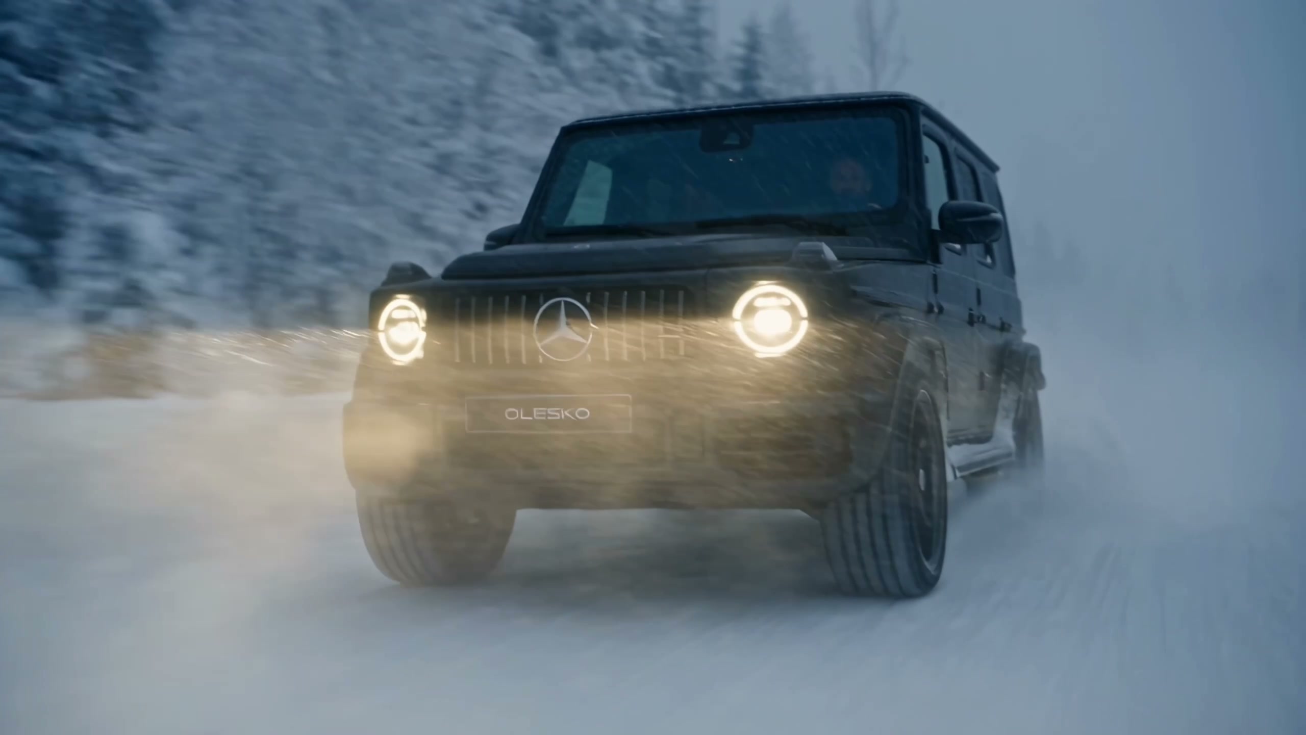 Matte black Mercedes-AMG G 63 in mountain snow