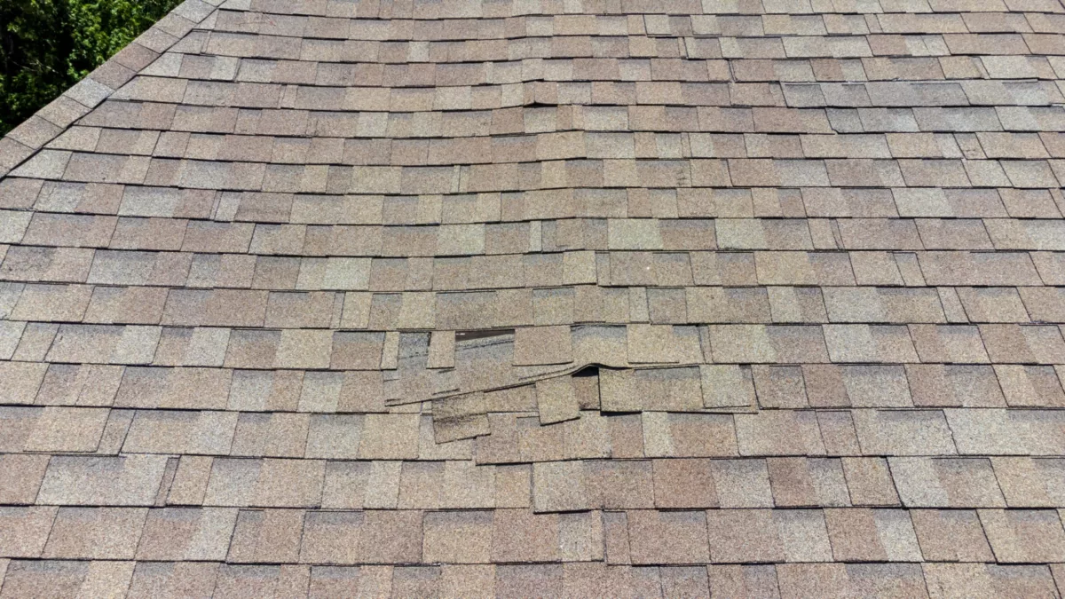 why is my garage roof damaged