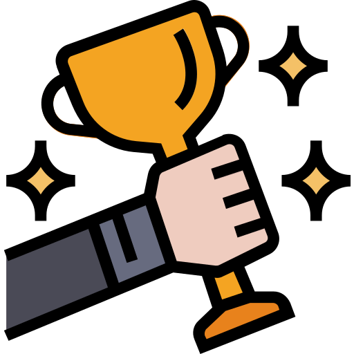 Hand holding a golden trophy cup with sparkles around it.