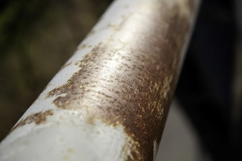 A weathered pipe that could use a replacement.