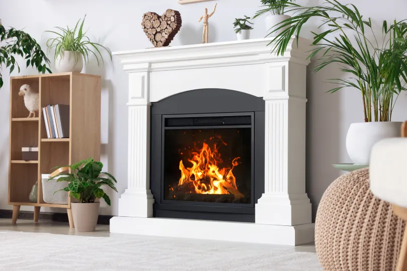 A cozy looking fireplace.