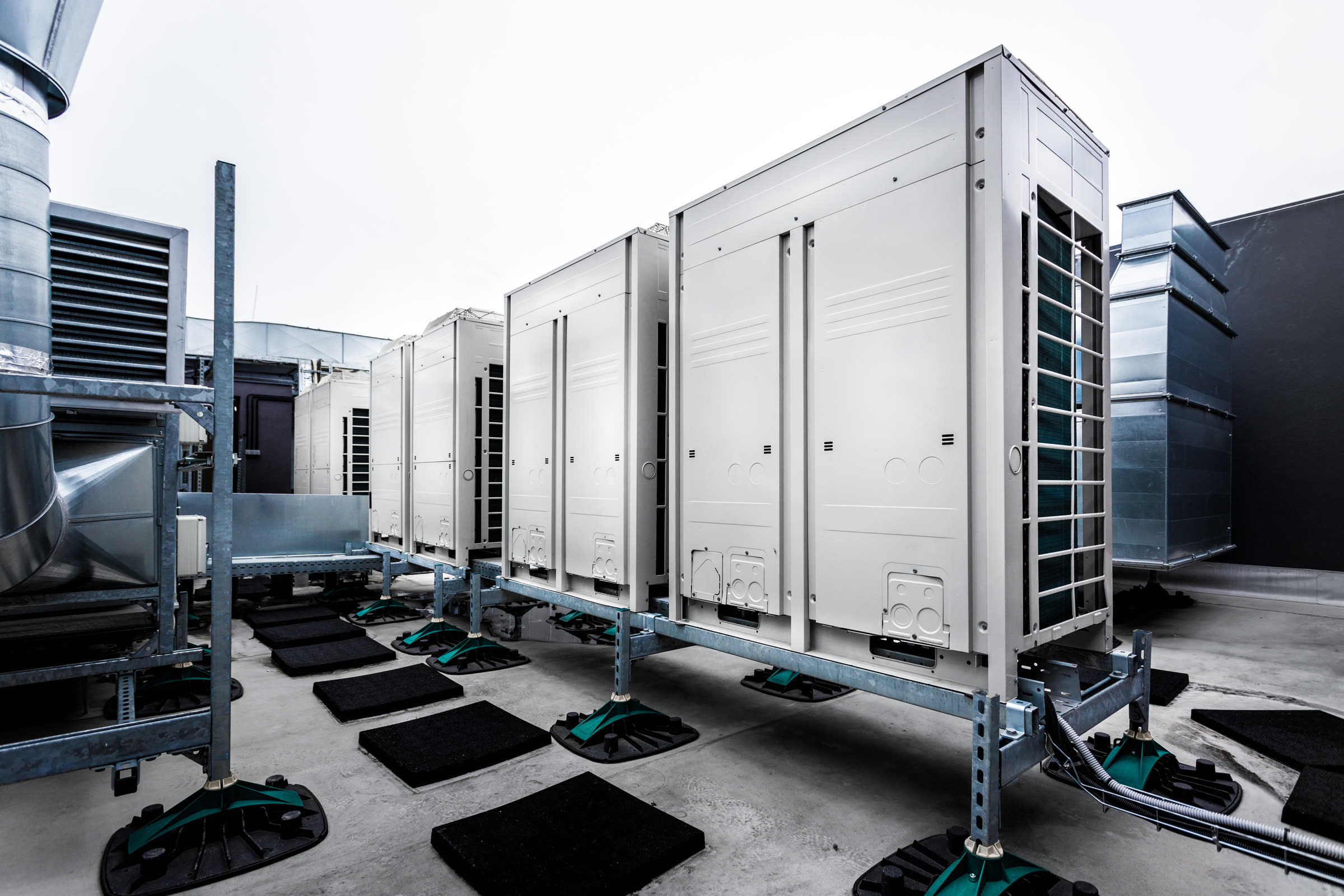 Commercial rooftop HVAC units on a business building