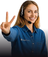 Smiling woman wearing headset and blue shirt making a peace sign with her hand.
