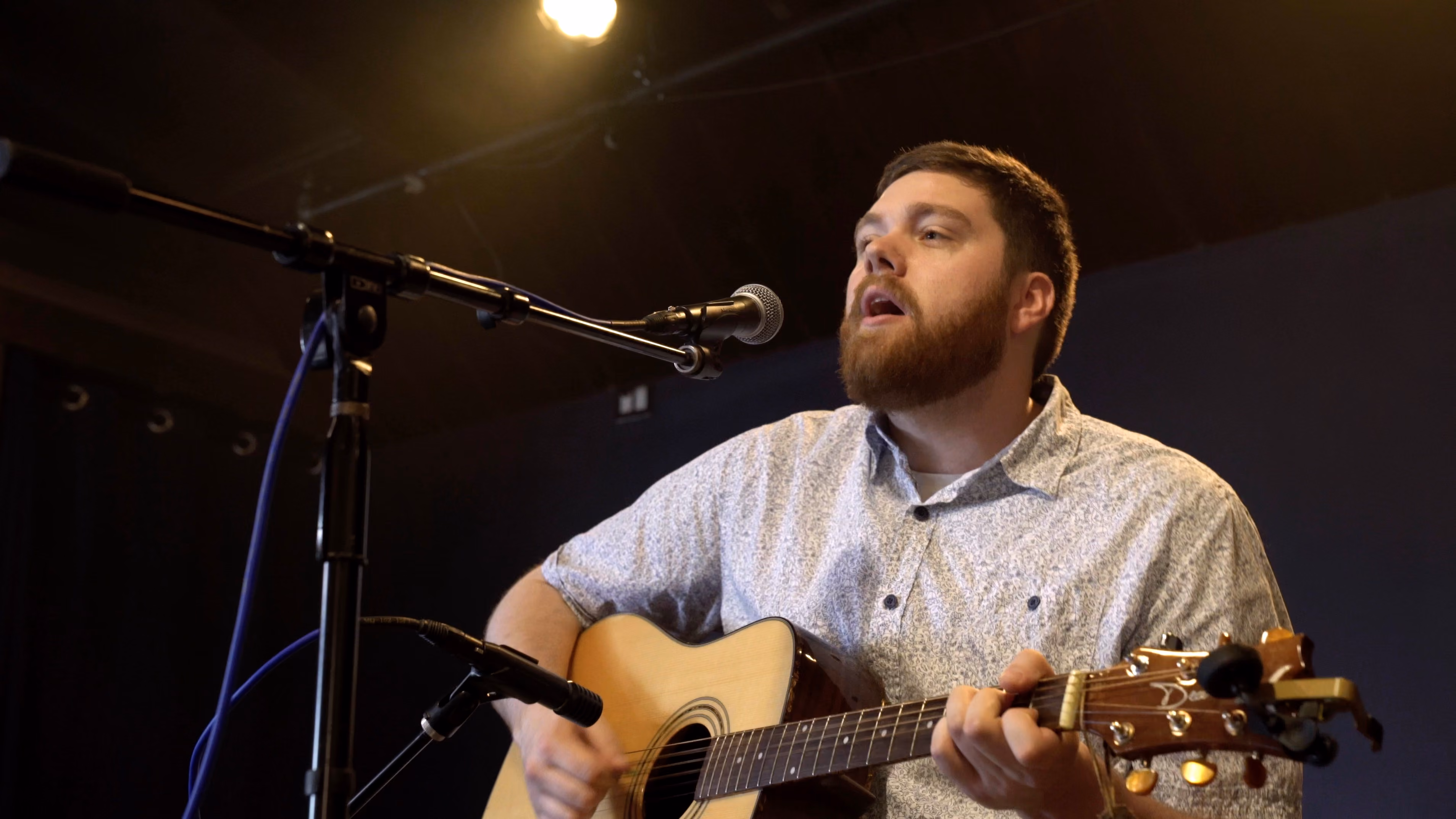 Ross Thorn performing on the single-location music video set
