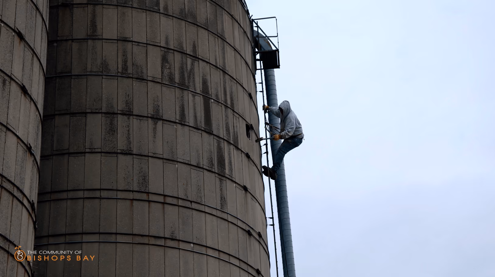 The farm silo coming down at Bishops Bay north of Madison
