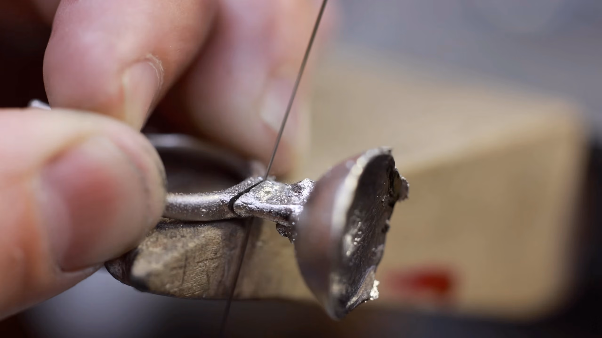 Close bench work from the custom sapphire ring build