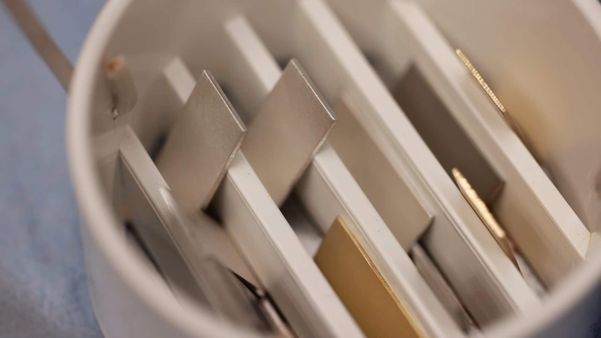 Layered metal being worked in the mokume gane process