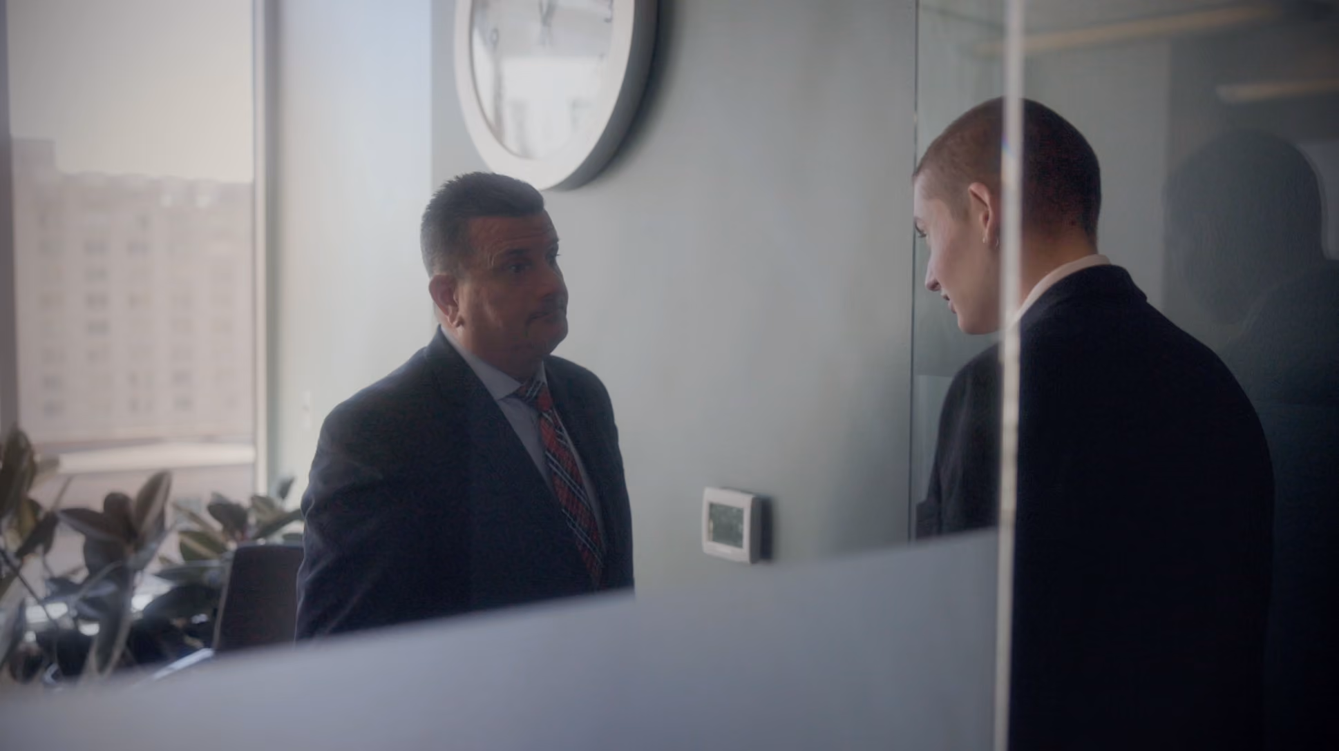 A moment from the Chalmers Jewelers watch commercial about a man running late
