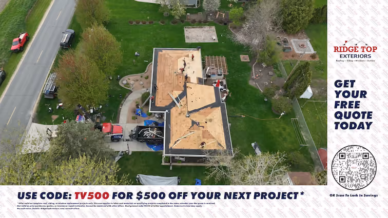 Aerial view of workers installing a roof on a house surrounded by green lawns and trees, with construction materials and vehicles nearby. A side banner shows the Ridge Top Exteriors logo, offers a free quote, and displays a QR code. A bottom banner reads: Use code TV500 for $500 off your next project.
