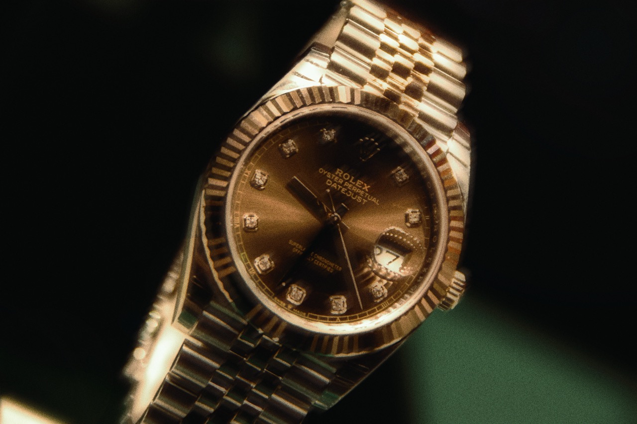 Gold watch with a diamond set dial
