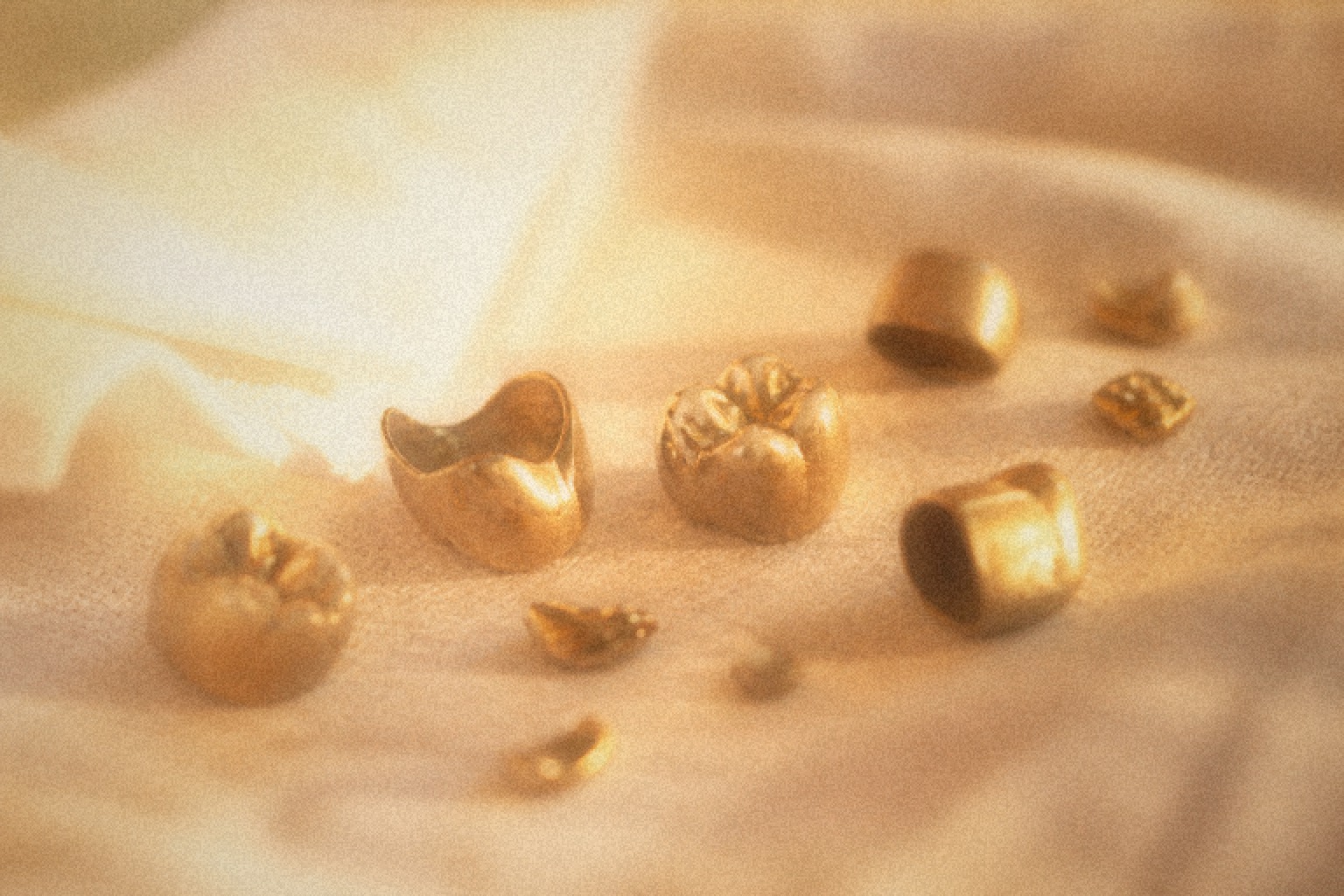 Yellow gold jewelry including a wide band ring