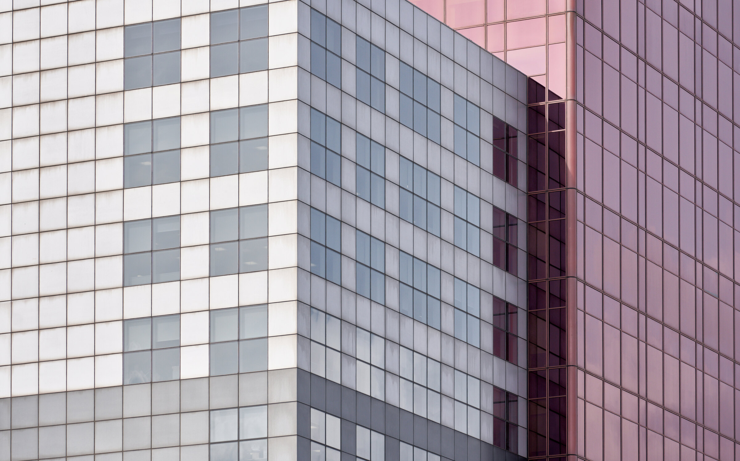 Glass office building seen from below
