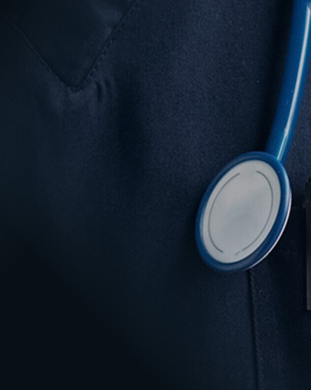 Close-up of a stethoscope against a dark uniform