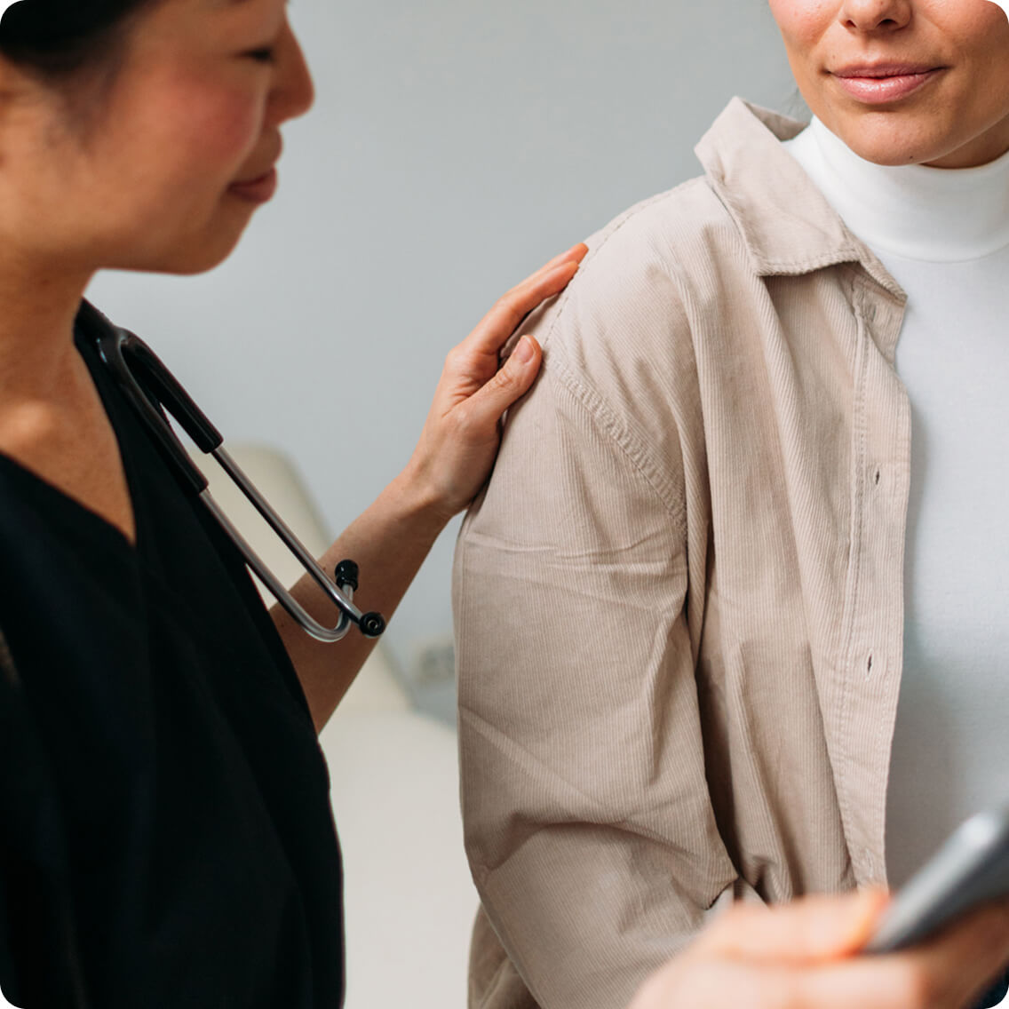 A doctor examining a patient during a check-up
