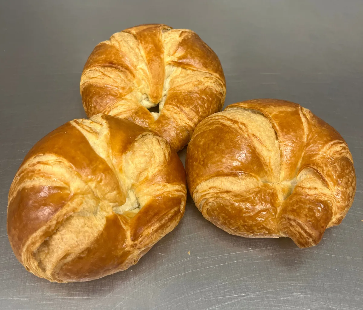 Three freshly baked croissants