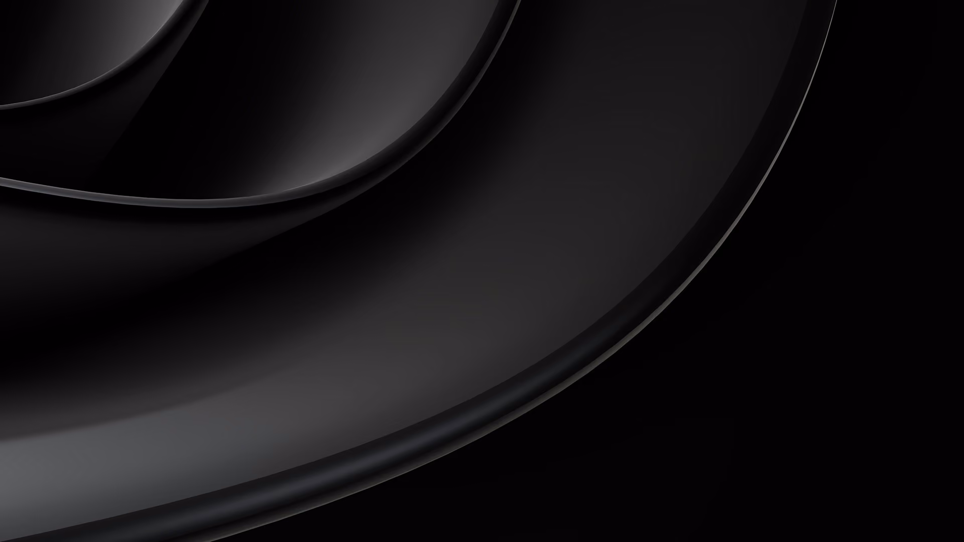 Abstract black curved layered shapes with smooth gradients and soft shadows.
