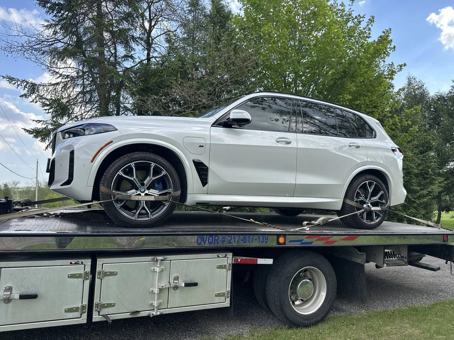 Luxury SUV on Triple S Towing flatbed in the GTA