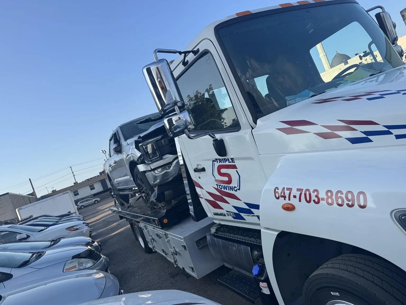 Triple S Towing branded tow truck