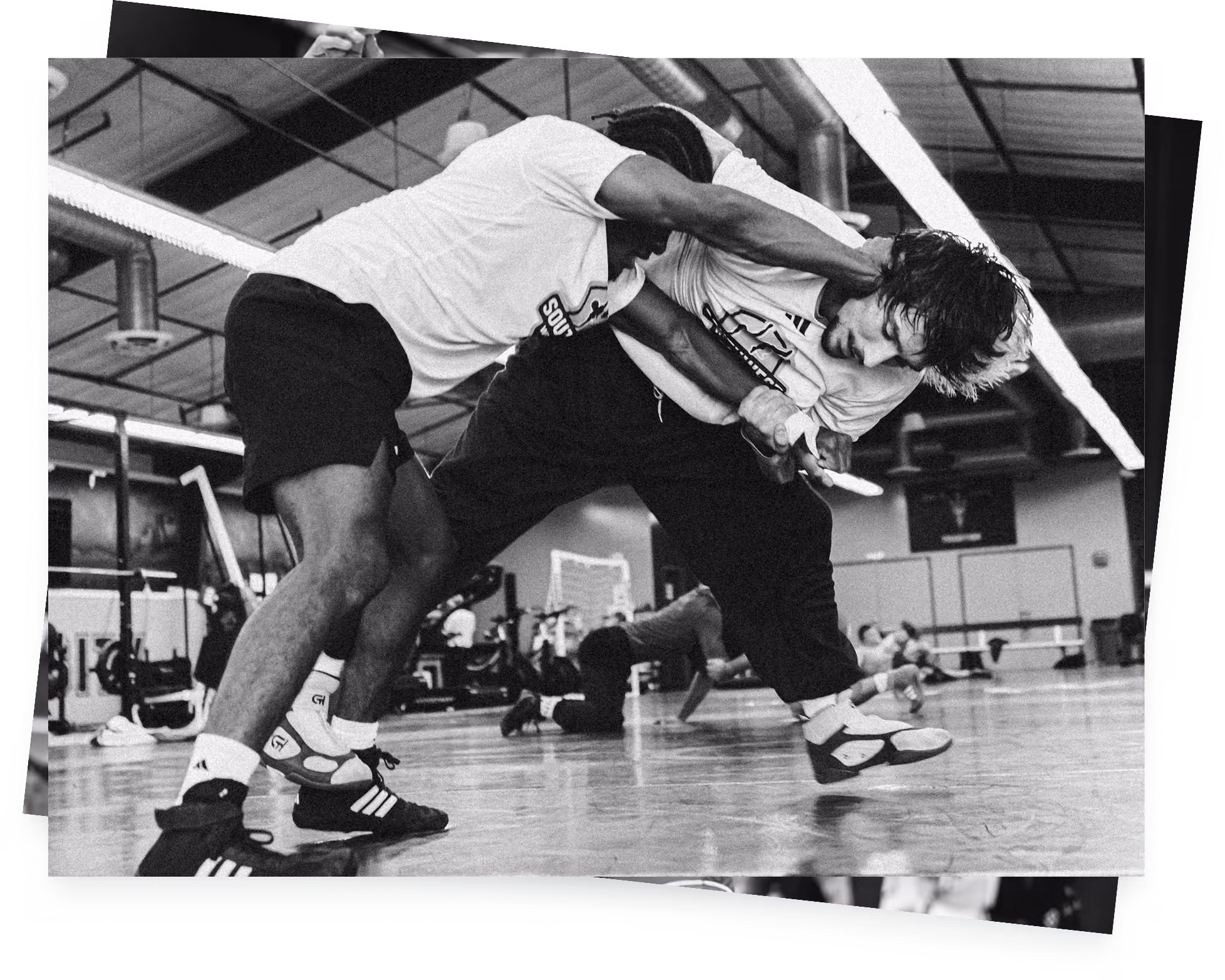 Two wrestlers competing during a Southwest Wrestling Club training session