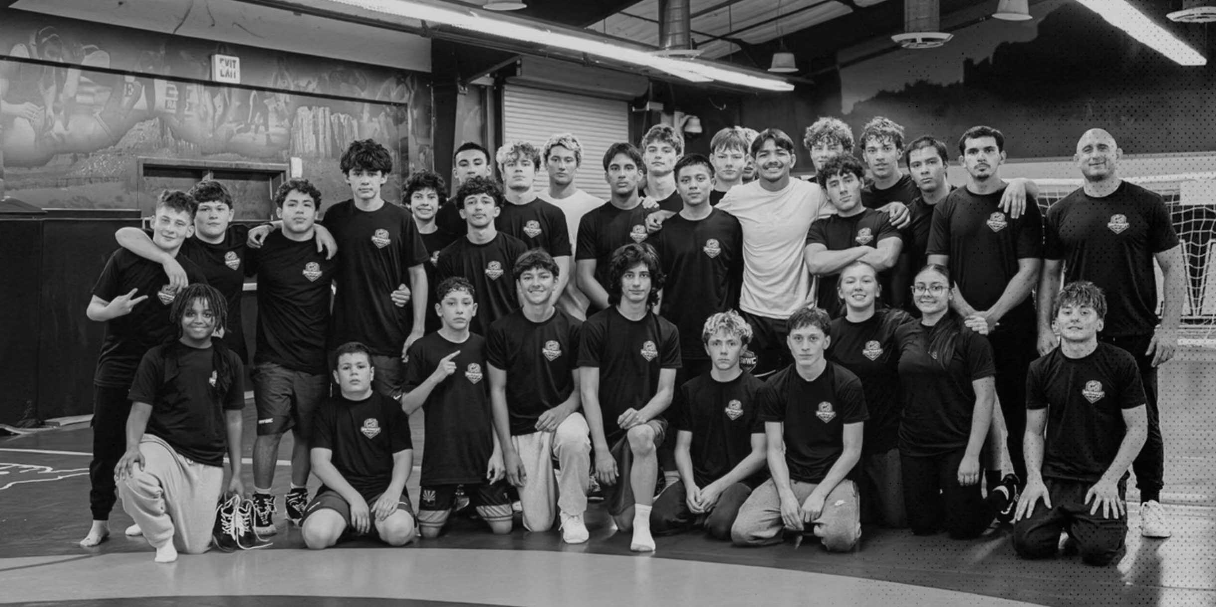 Wrestlers and coaches together at a Southwest Wrestling Club camp
