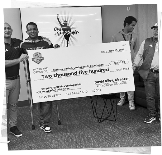 Southwest Wrestling Club presenting a donation to the Anthony Robles Unstoppable Foundation