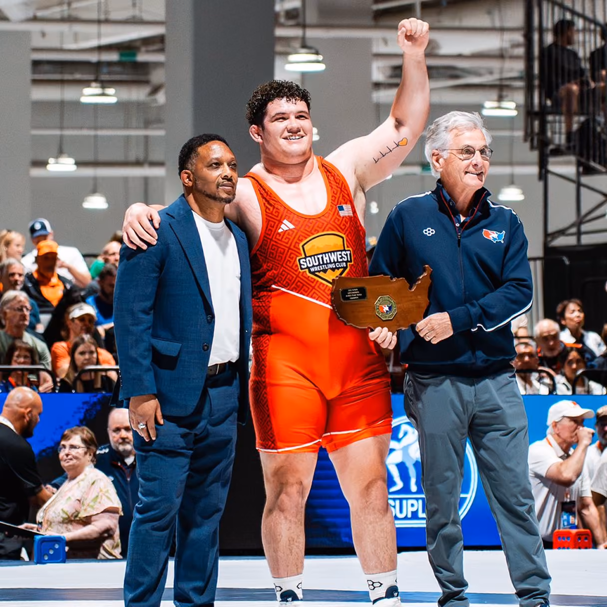 Southwest Wrestling Club wrestler celebrating an achievement after competition