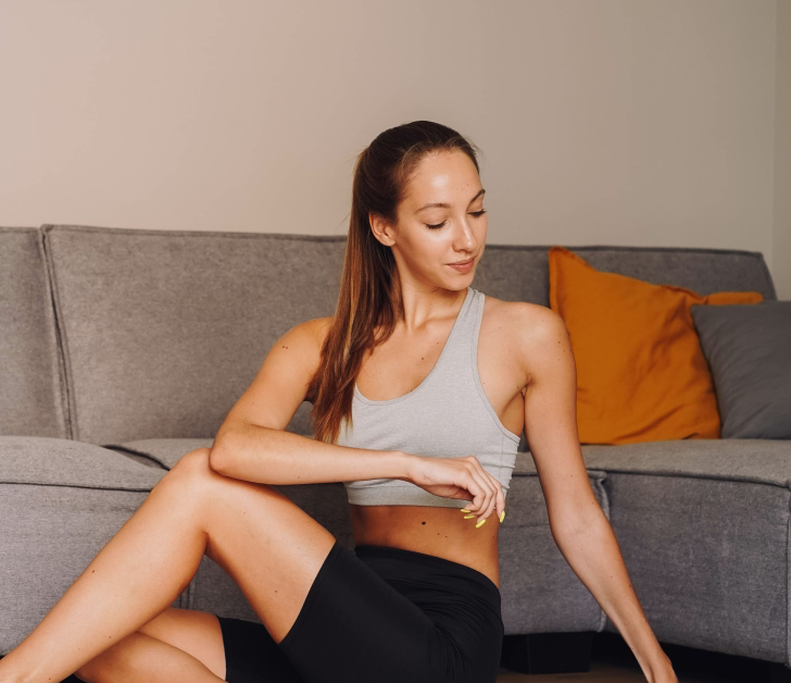 Woman practicing gentle morning yoga poses