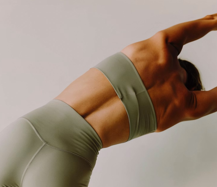 Woman practicing mindful breathing during yoga