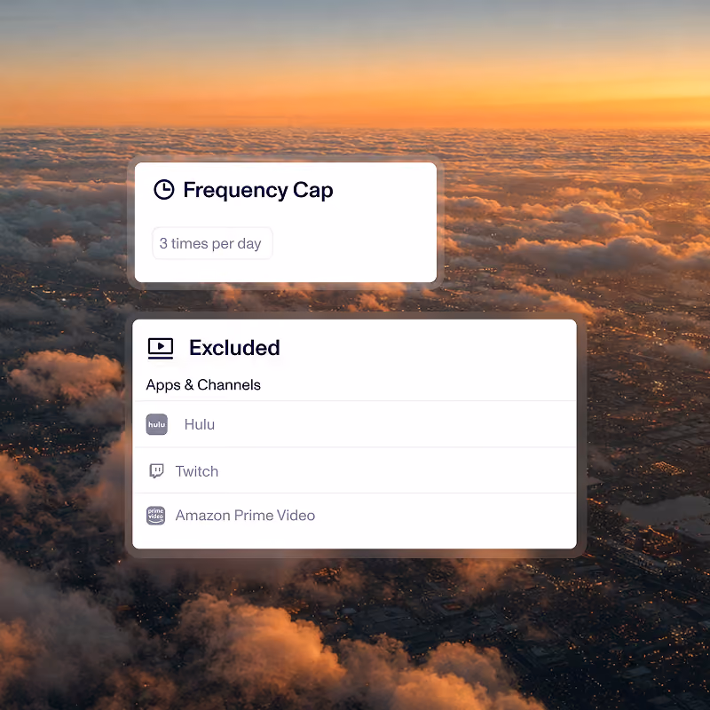 Sunset aerial view above clouds with two floating white interface boxes: one labeled 'Frequency Cap' showing '3 times per day' and another labeled 'Excluded' listing apps and channels Hulu, Twitch, and Amazon Prime Video.