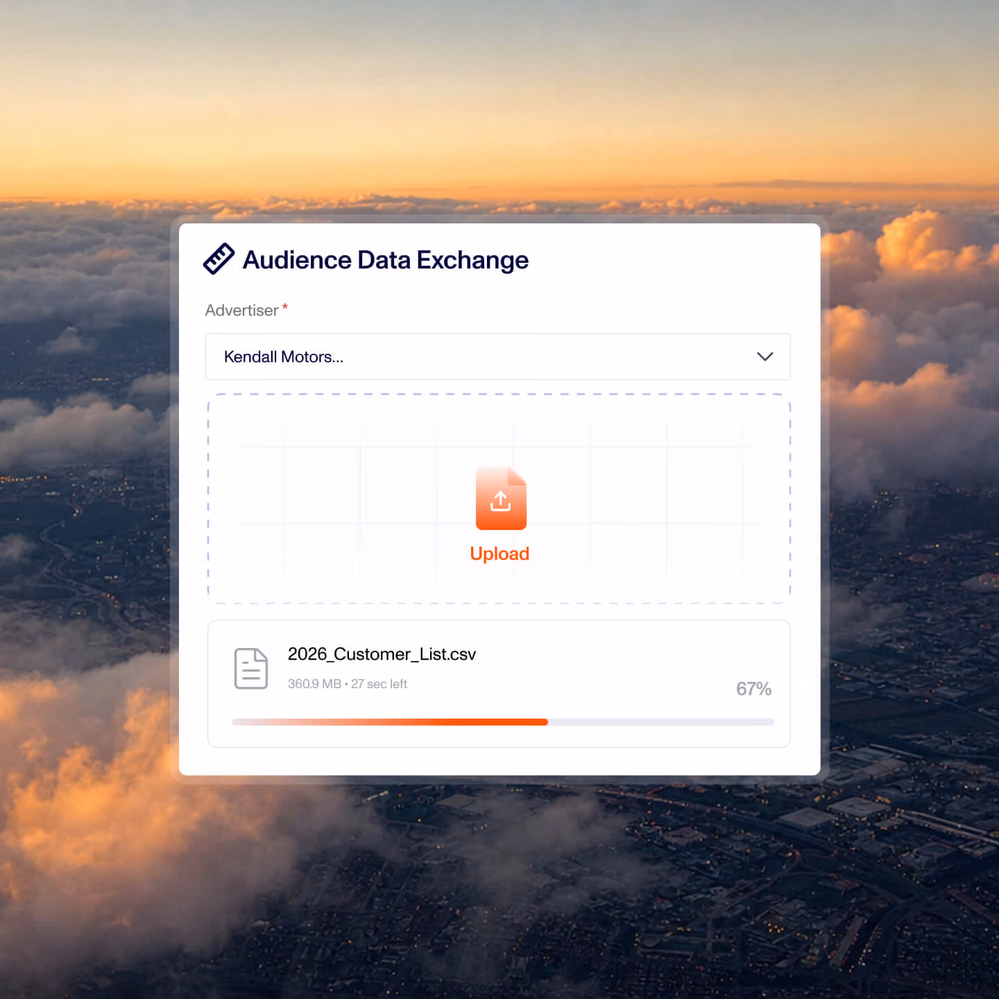 User interface of an Audience Data Exchange platform with a dropdown labeled Advertiser showing 'Kendall Motors', an upload section with an orange upload icon, and a file upload progress bar at 67% for '2026_Customer_List.csv', over a background image of a cityscape with clouds at sunset.