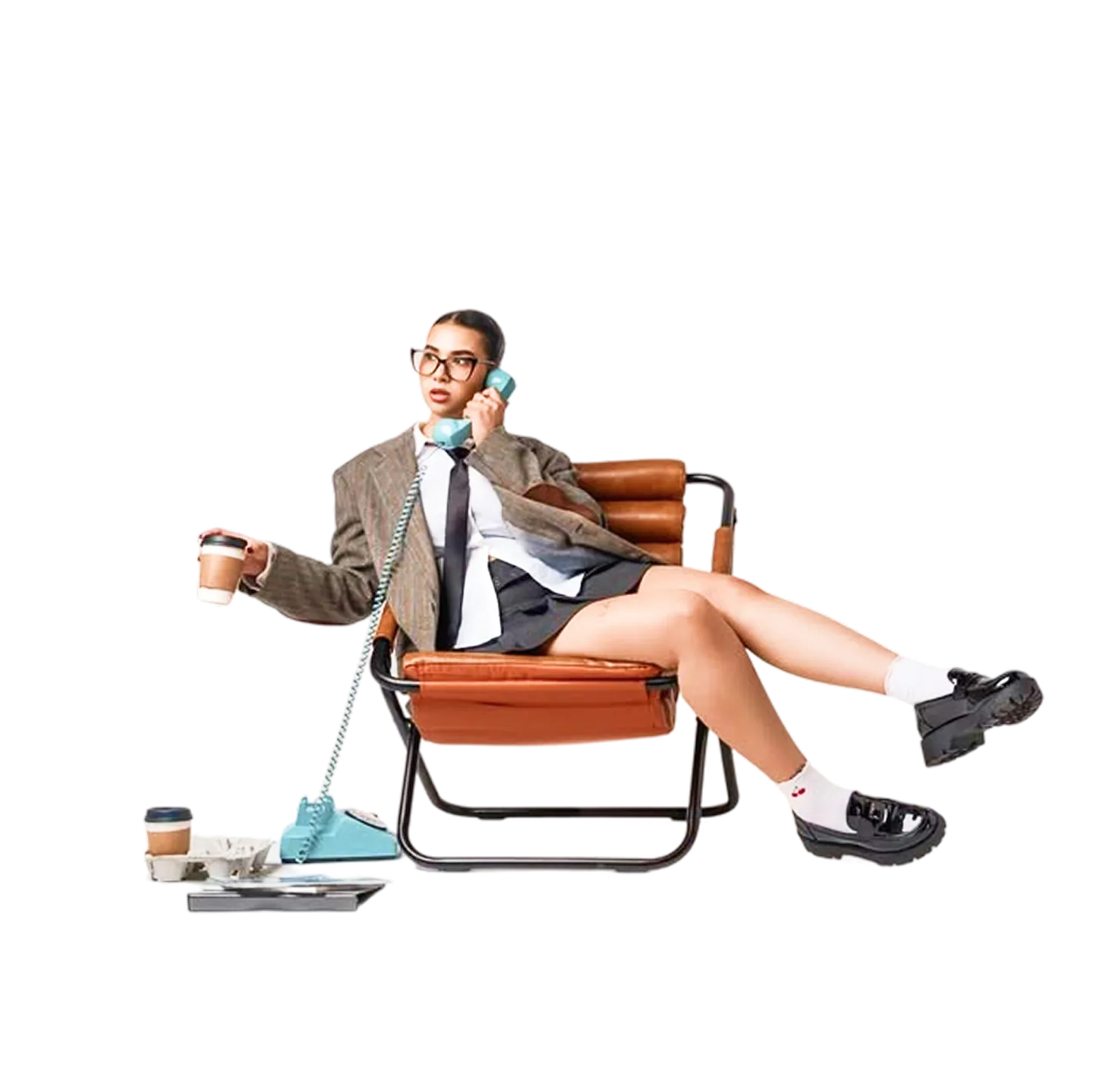 Woman in a lounge chair talking on a retro telephone