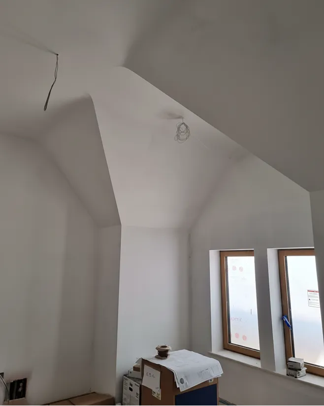 High-level plastering at Caldy Baan, Wirral