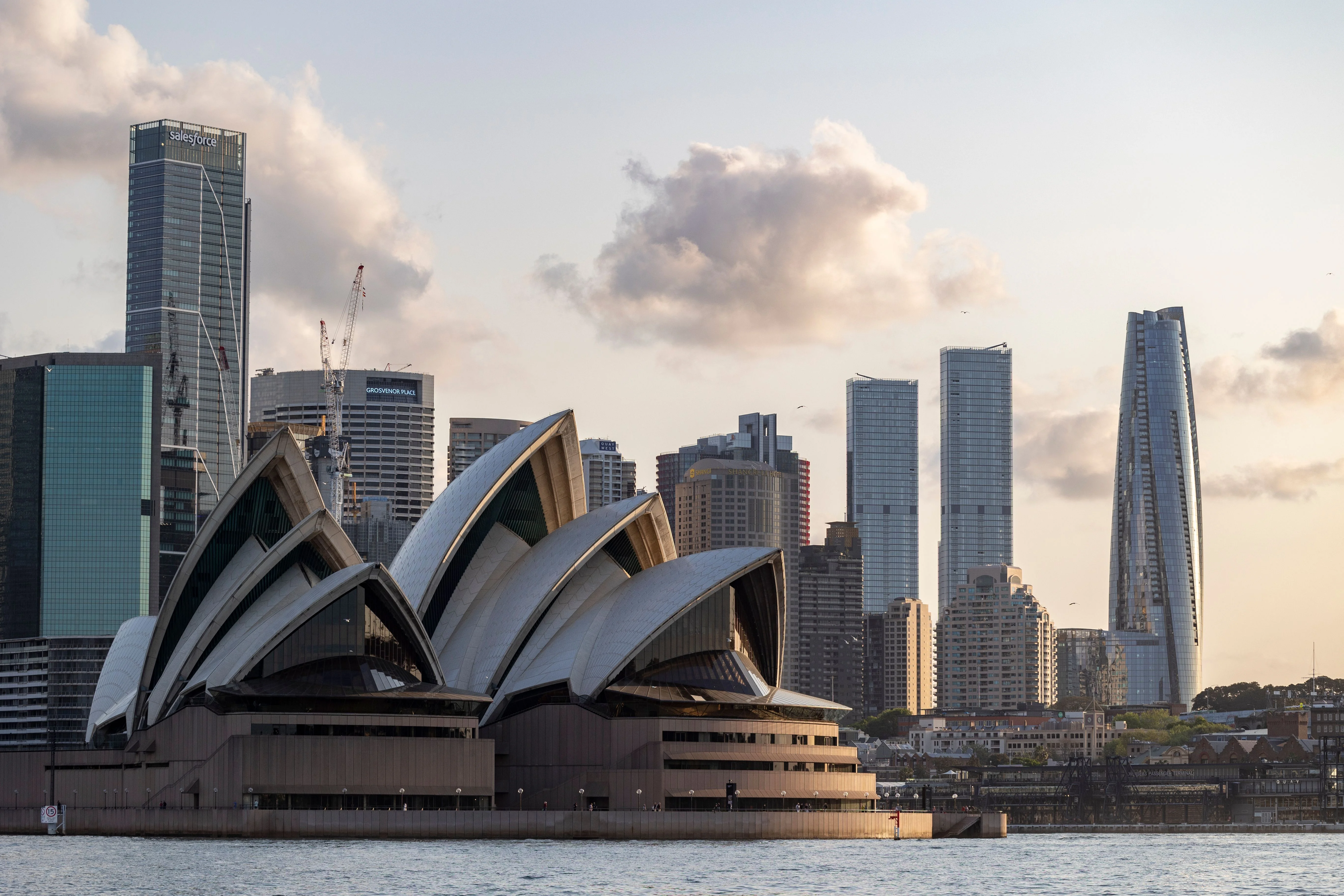 Sydney skyline and Opera House at dusk