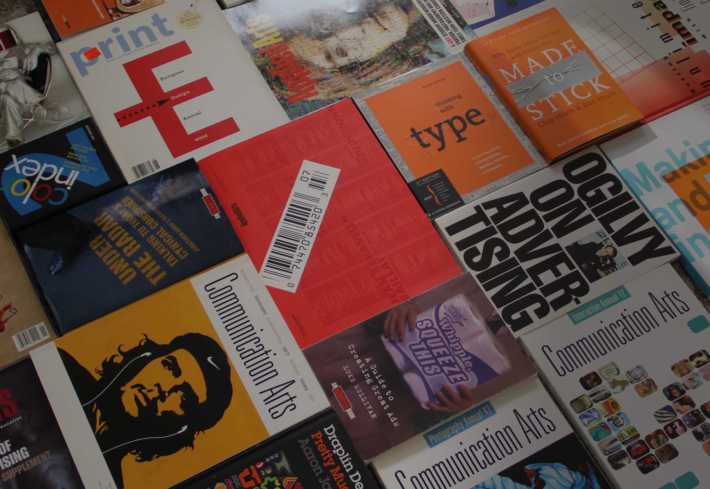 A collection of graphic design publications arranged in a grid