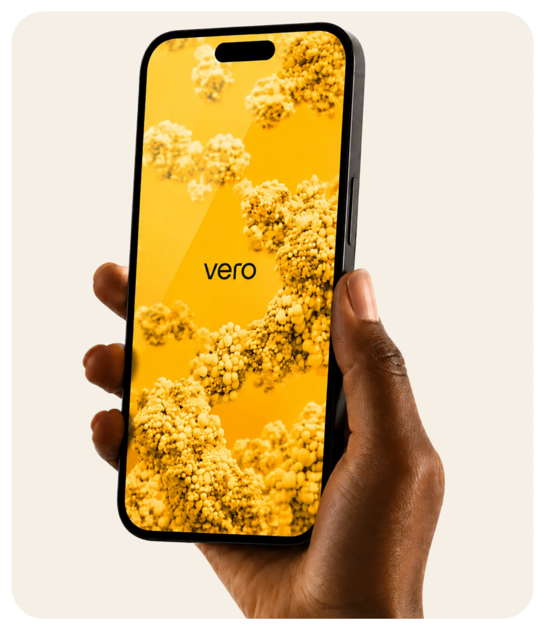 A hand holding a phone showing the Vero app