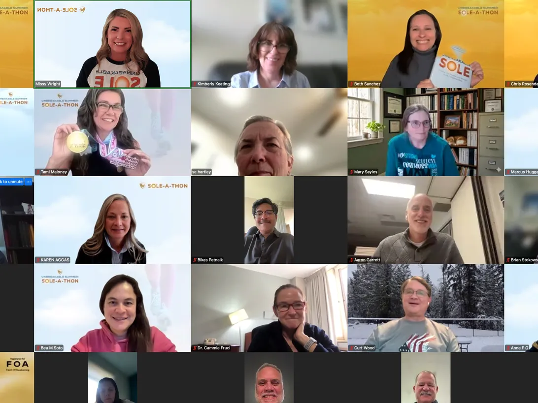 A large virtual session with attendees on screen