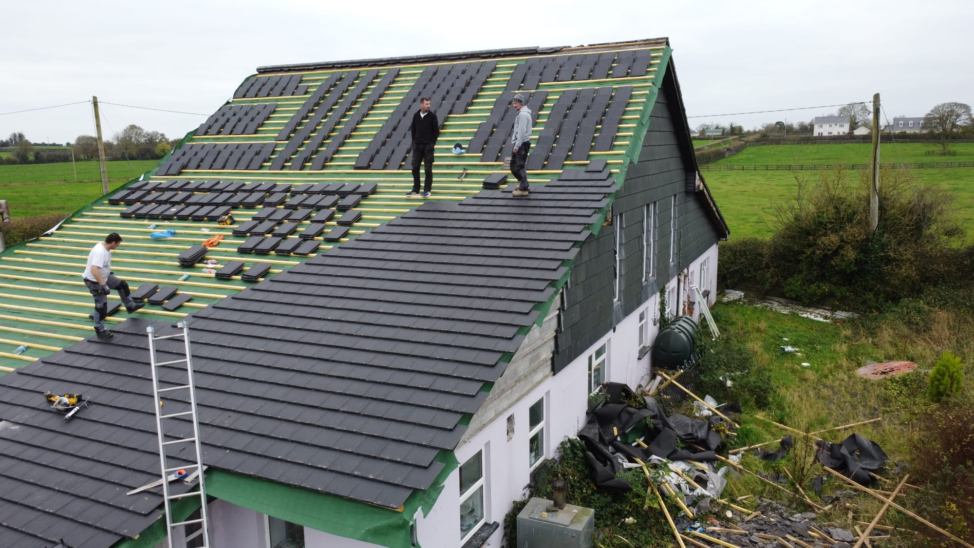 Overhaul Roofing team completing a slate roof repair in Cork